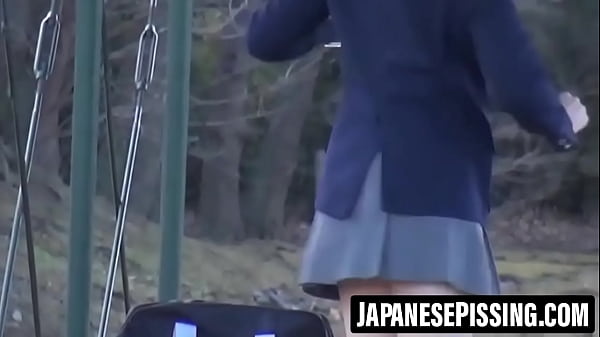 Cute developing Japanese girl pees hard on the bathroom floor after drinking and then cleans everything